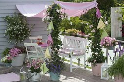 Pink-white balcony with awning