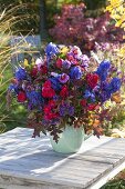 The last garden bouquet of blue and purple flowers