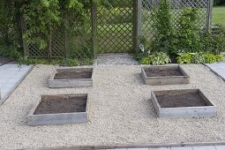 Building Square Garden beds on concrete pavers