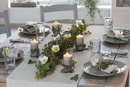 Ivy table decoration with candles