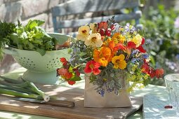 Colourful bouquet of Tropaeolum (Nasturtium), flowers of beans