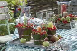 Late summer table decoration with rowan berries