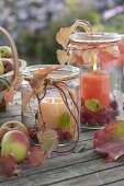 Large preserving jars as lanterns with malus