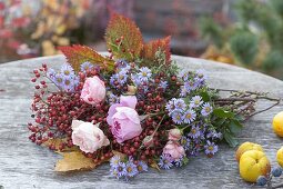 Ingredients for autumn bouquet: Pink (roses and rosehips), Aster