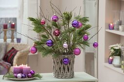Bouquet of branches of Pinus branches berry-colored decorated