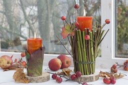 Natuerliche Kerzendeko am Fenster