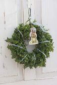 Easter wreath from Buxus (Box) with Easter wafer