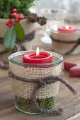 Christmas table decoration with straw bales on the terrace