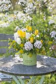 White-yellow Tulipa (tulip) bouquet, Viburnum carlcephalum