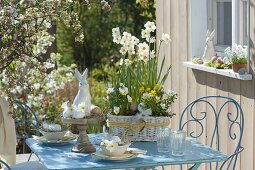 White Easter table decoration on the terrace