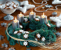 Advent wreath tied from Nobilis fir and with different star motifs