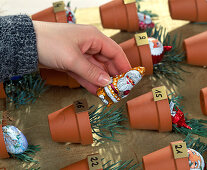 Advent calendar with clay pots. 5th step