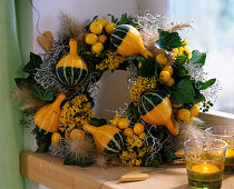 Pumpkin wreath. Cucurbita (pumpkins), Capsicum (ornamental peppers), Calocephalus