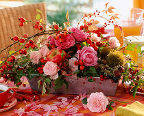 Rose arrangement in the metal basket