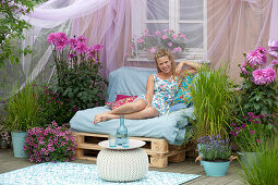 Terrace with homemade couch made of pallets