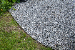 Gravel area bounded by iron in the soil