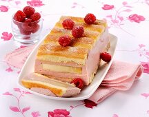 Charlotte with banana and raspberry cream