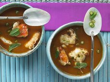 Crawfish soup with tomatoes, ginger and chili