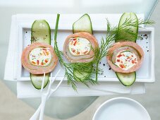 Cucumber and salmon roulade stuffed with cream cheese