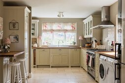 Pale country-house kitchen