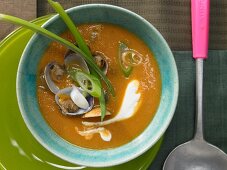 Mexican tomato soup with mussels and cumin