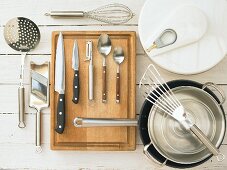 Kitchen utensils for making red mullet with lettuce, green asparagus and fennel