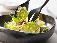 A bistro salad with apple and a hazelnut vinaigrette