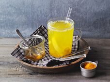 Hot lemon and ginger tea with turmeric