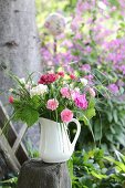 Posies of carnations in jug