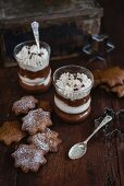 Vegan chocolate and coconut mousse made with aquafaba (chickpea brine) served with star-shaped gingerbread cookies