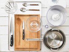 Kitchen utensils for making pumpkin puree with fried mushrooms and pumpkin pesto