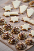 Butter cookies with walnuts on baking paper