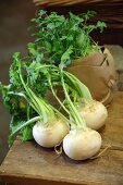 Fresh turnips on a wooden table
