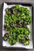 Kale chips on a baking tray