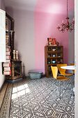 Dining room with patterned floor and two-tone walls and ceiling