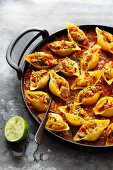 Pasta shells filled with Creolean-style mussels