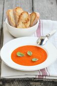 Tomato and red pepper soup with basil