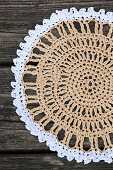 Crocheted raffia doily