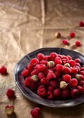 Raspberries on a tin plate