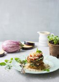 Aubergine sandwich with tomato, basil and blue cheese sauce