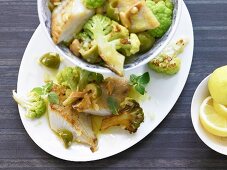 Pollock fillet with fried romanesco and olives