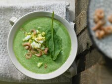 Sorrel cream soup with crab and egg