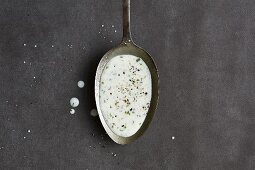 A spoonful of low-calorie ranch dressing made of yoghurt and buttermilk