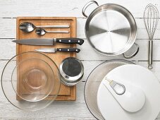 Kitchen utensils for making browned goat's cheese with vegetables and herbs