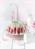 Raspberry marble gugelhupf with marshmallows for a birthday party