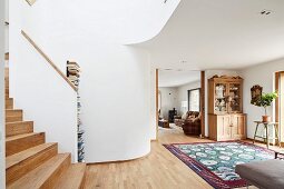 Open-plan interior with foot of staircase