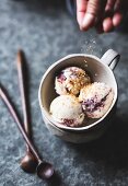 Sprinkiling brown sugar on for fig swirl ice cream