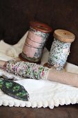 Vintage reels of beaded thread and beaded ornament