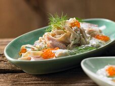Pasta in a creamy dill sauce with smoked trout and caviar