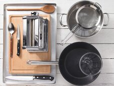 Kitchen utensils for the preparation of pasta with smoked fish